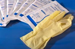 wearing surgical gloves